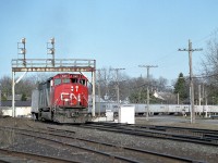 Flashback to when the Triple Crown service was operated by CN.........it has been gone quite a few years already.  It is late in the day as CN 5411 rounds that swooping curve out by Paris Jct. The 5411, an SD50F, has departed the roster along with all the rest in the 5400-5459 series. Today, 5411 you see is now an SD60, formerly GMTX, the bunch of which was acquired in 2012.