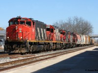 CN L568 is viewed departing Kitchener on the Guelph Subdivision with 9547, 4730, 4131 and 4130 as it heads westbound to Stratford with a short train.