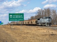 CP 7023 leads an empty Potash train through Camrose, Alberta