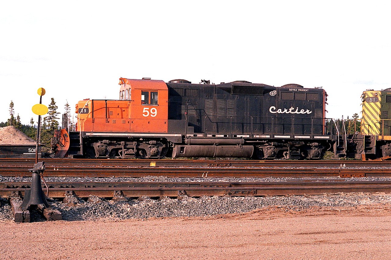 Nice morning shot of Cartier GP9 #59, along with #51 awaiting next assignment. This unit went on to become Essex Terminal's #108; as seen in a really nice image by Geoff Elliot (RP #11581) As I post this I find it so hard to believe it has been over 40 years since I have been to Cartier. But I say that about a lot of places..........