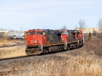 2022.03.20 CN 2507 leading CN A43531 20, CN 2614 and CN 8941 trailing, departing Mac Yard Halton outbound track at Ovell