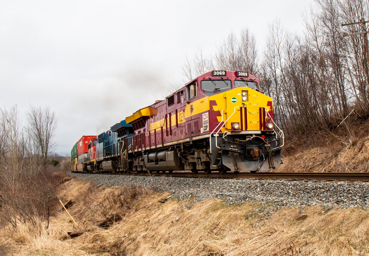 Wisconsin Central Heritage unit CN 3069 leads the  Z120 through Truro heading east to CN’s Rockingham yard in Halifax with help from GECX 2037,CN 9454 and mid train CN 3067