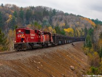 In October of 2021, myself & my father ventured up to the Sudbury area, primarily in hopes of catching <a href="http://www.railpictures.ca/upload/cp-6018-east-leads-the-levack-turn-towards-sprecherclarabelle-with-46-loads-from-the-coleman-mine-in-levack-at-the-perfect-moment-in-onaping-falls">the Levack turn</a>; a Nickel ore job run by the CP which goes from Sudbury to Levack & back apparently every weekday. For whatever reason, both mornings we were up there, the train simply just did not run. What did run however was this CWR train from Cartier Yard, set to dump rail along the Cartier Sub near Levack. Unbeknownst to me at the time, the arrangement of this train was nothing short of silly. The caboose & MOW crew were on the south end of the train, and the power on the north end, with both units facing south and the engineer operating inside the 6013. We had caught up to the train alongside HWY 144 near Onaping Falls but had only seen the rear of it where the caboose & MOW crew were. Later when I heard RTC call the "6013 North" and instructed them to take the Levack siding for a pair of southbounds, my face lit up to the idea of shooting an SD40 leader up in this beautiful scenery. Could this be my redemption for not getting the ore train? The short answer; not really. When I saw the ass-end of 6259 round the corner ahead, the optimism went right out the window. But now looking back it was still a hell of an experience to get up there, and I'd do it again in a heartbeat.