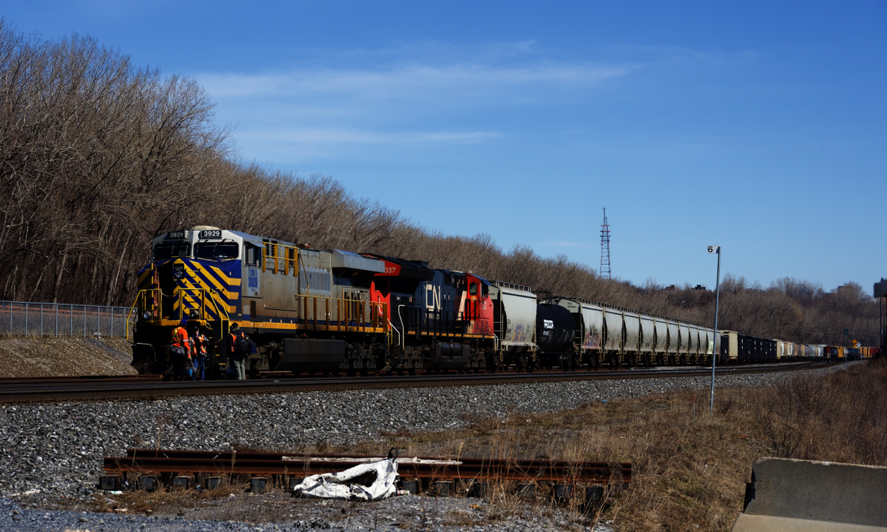 Ex-CREX leaders on CN 305 have been quite common since last fall, and here CN 305 has one leading as it changes crews at Turcot Ouest. Unit numbers are CN 3929 & CN 3037.