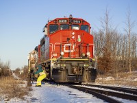 <b>Line 'em up.</b>  With their work at WestRock finished, 540's conductor normals the switch to back onto their train.  They'll drop a cut of gons for Gerdeau in XV yard before returning to Kitchener after sundown.