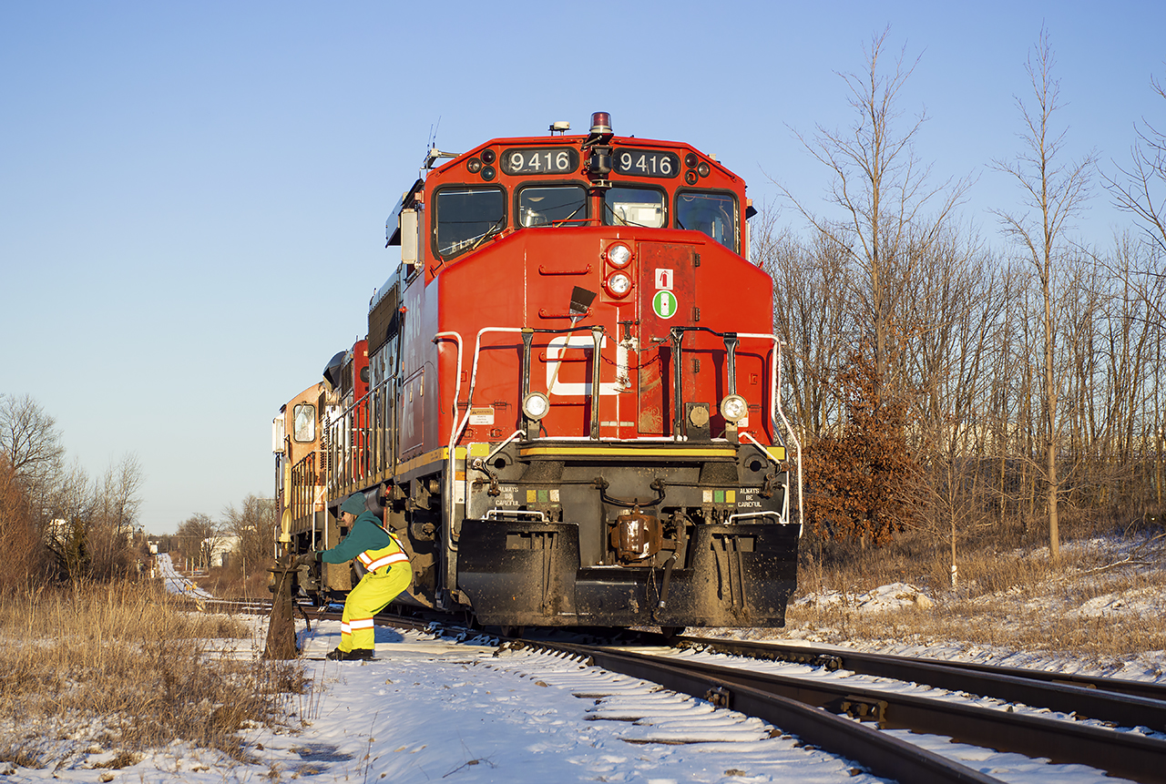 Line 'em up.  With their work at WestRock finished, 540's conductor normals the switch to back onto their train.  They'll drop a cut of gons for Gerdeau in XV yard before returning to Kitchener after sundown.