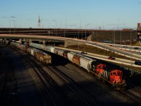 CN 596 has a pair of GP9s (CN 4140 & CN 7060) as it heads to Taschereau Yard with 80 cars.