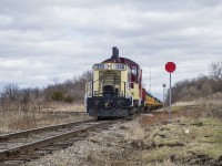 In response to trackwork on the CN Talbot Sub, OSR has been handling automotive frames from the Formet plant at St. Thomas to CN at Beachville rather than the usual direct CN routing.  Arriving with 16 empties, OSR shoves across the diamond towards the plant with it's second chunk of 8 cars, where it will wait for L583 with CN 4730 to arrive to pull the loads for them.
