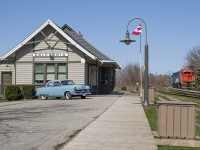 A pair of blues pull ahead to clear the switch for Nicholson & Cates while a 1953 Ford Mainline basks in the sunshine at the old station.  The Ford is up for sale.  I didn't get a price but it is in mint condition inside, outside, and under the hood.
