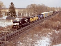 At first glance from a distance I originally thought this was NS train 327. As the mixed traffic became more apparent I knew this was not the case. CN this day in Toronto must have been very desperate for motive power.  This days CN 393 has a NS Dash-9 and former Conrail Dash-8 bracketing a HLCX former UP SD60. The shot is off the highway 2 overpass in Creditville. A shot I used to love but unfortunately has grown in a lot over the years. 