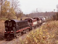 The financial woes of the later 2000’s was felt pretty much everywhere. From what I was told at the time OSR used it’s small group of RS23’s mist of the time then as they were cheaper to operate then the RS18U’s. Fir the most part the daily train to Guelph ran regularly with anything from one to three of the RS23’s. They quickly became  my favourite Alco/MLW end cab switcher. The crossing at concession Road 11 north of Moffat soon became my favourite spot to catch the northbound morning train which never worked well with the lighting conditions for most of its run. Here a trio of the RS23 “rockets” dug into the slight grade as they pass through the changing fall colours. 