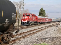 CP's new TEC train heads eastbound through Streetsville after spending the last few days along the Windsor and Hamilton subdivisions. The train is seen passing 3 tank cars left along the main by H24 earlier, that will later make their way to Hornby yard. 