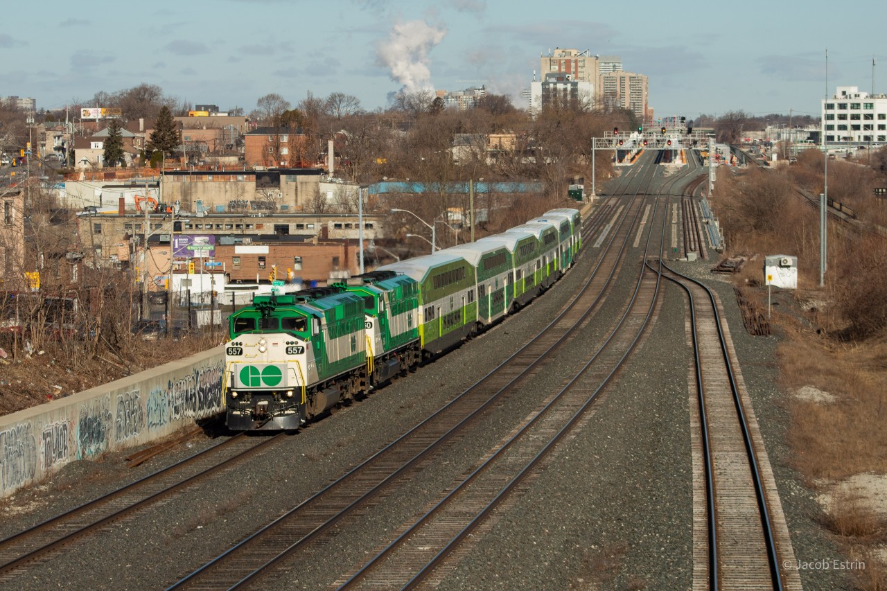 After a brief station stop at Weston GO 3710 quickly picks up speed as it races down the Weston Sub previously blowing its horn for the construction workers at the future Mount Dennis Station which will connect Eglinton Crosstown passengers with the Kitchener Line as well as UPX service.