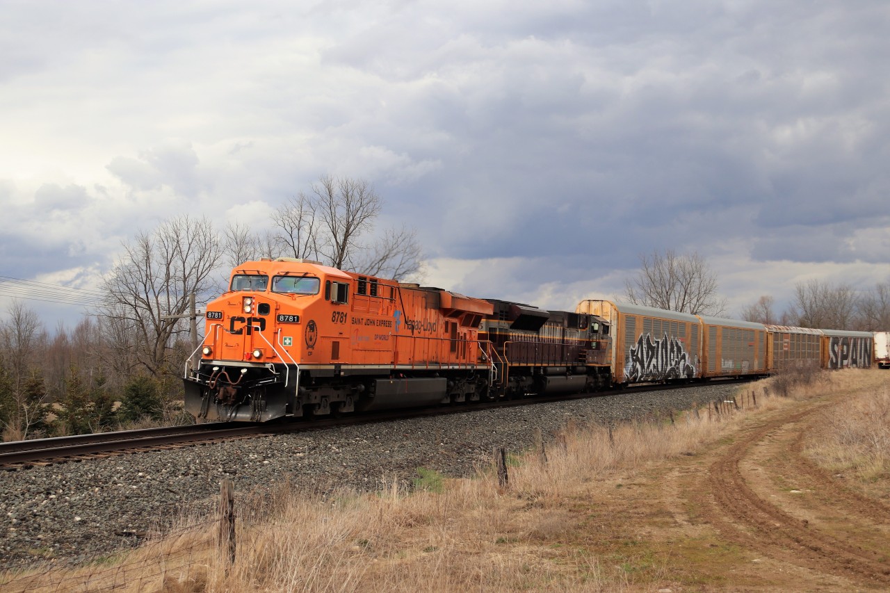 It has been a while that I can remember since I've saw a double CP lash up with no dirty red in it but today I have. Bright orange CP 8781 dressed up in its Hapag Lloyd colors with CP Heritage unit CP 7015, (former CP 9126) slowly roll west up the Galt sub on the approach to Victoria Road.