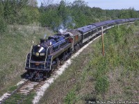 Almost to the end of the line, CNR 6060 leads an excursion from Toronto up to Midland at Victoria Harbour, rounding the curve beneath Park Street.<br><br>More Midland Sub:<br><a href=http://www.railpictures.ca/?attachment_id=13189>July 1958 by Bill Thomson</a><br><a href=http://www.railpictures.ca/?attachment_id=28324>August 1976 by Arnold Mooney</a><br><a href=http://www.railpictures.ca/?attachment_id=48634>March 1989 by Barry Schroeder</a><br><br><i>Dave McKay Photo, Jacob Patterson Collection Slide.</i>