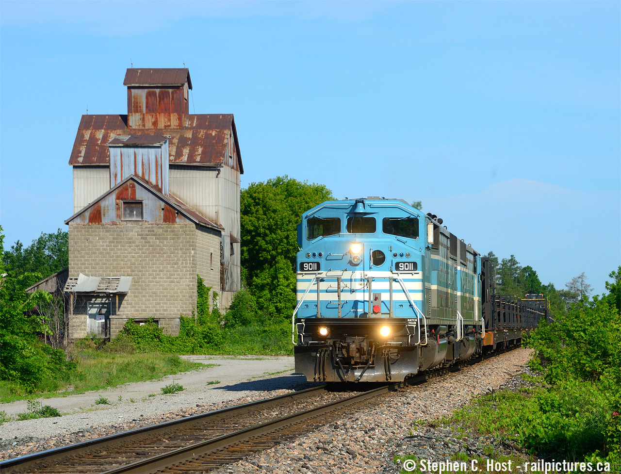 It's hard to believe this scene is so close to Toronto, but it is, and at what would have been Kleinburg Ontario is some old grain elevator (not the prettiest looking one, mind you) still standing in defiance to Toronto land prices. Here is a rail train heading south after parking overnight in Palgrave in nice morning light. Also, as it would turn out, some of these are now in Mayfield KY getting rebuilt and repainted by Progress Rail back into  CP beaver.