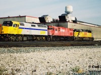 Leased VIA Rail 6455, CP 4239 and leased GATX 2000 are seen together at CP's diesel shop at their Toronto Yard during a fall morning in October 1994. Later that day, CP 4239 and VIA Rail 6455 would be assigned to train 923. 

http://www.railpictures.ca/?attachment_id=43903

