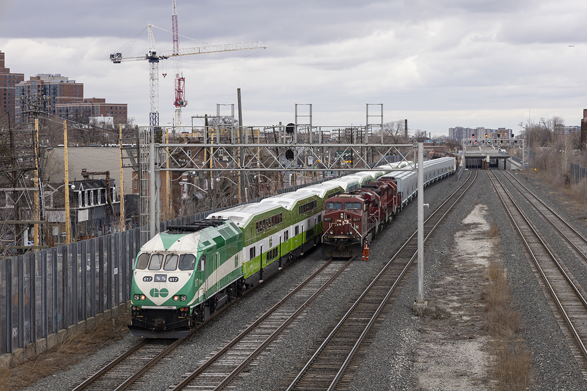 CP 8877E Extra Yard gives a rollby to GO 617W at Dupont. The CP had been needing the signal at Dupont numerous times that day while working a large train apart into Lambton Yard, one the first pull they almost made it as far as Dundas Street.