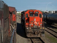 CN 507's power is seen tied down at the west end of the yard in Lloydminster Alberta. The exNAR SD38-2s were regulars on the 507 at this time. Viewed from the the second unit on the daily A411 out of North Battleford.  