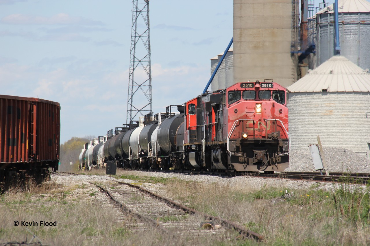 CN 502 is pictured on the approach to Hagersville crossing with CN 2510 leading an SD75i.