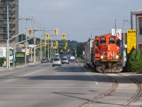 My university years were spent in the City of Brantford which meant I was afforded frequent opportunities to photograph the Burford Spur.  CN operated the line when I first started my BA/BeD program, it would change hands to the SOR and ultimately a track maintenance company and a trackmobile...I haven't photographed it since the last SOR train.  Pictured is a lovely October day with CN 4112 heading down Clarence Street on their way to Ingenia.