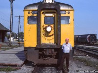 The engineer on VIA Rail 189 poses in front of his pair of Budd RDCs at Havelock before departing on the second last run to Toronto.  The final westbound run would take place the following day, Monday, September 6, 1982.  In a few years time, the Havelock train will be reinstated on June 3, 1985, before being cut for good in January 1990.<br><br>More of the “Havelock Budds”:<br><a href=http://www.railpictures.ca/?attachment_id=39310>Havelock, July 1976, Arnold Mooney</a><br><a href=http://www.railpictures.ca/?attachment_id=25461>Burketon, July 1976, Doug Hately</a><br><a href=http://www.railpictures.ca/?attachment_id=43382>Havelock, August 1977, Arnold Mooney</a><br>A series of shots by Steve Danko, showing the second last run, September 5, 1982:<br><a href=http://www.railpictures.ca/?attachment_id=7752>Arriving Peterborough</a><br><a href=http://www.railpictures.ca/?attachment_id=44354>Pulling down the shoe fly</a><br><a href=http://www.railpictures.ca/?attachment_id=44008>The platform scene at Peterborough</a><br><a href=http://www.railpictures.ca/?attachment_id=7694>Toronto-bound through Pontypool</a><br><a href=http://www.railpictures.ca/?attachment_id=44395>Last Day at Peterborough, Eric May</a><br><a href=http://www.railpictures.ca/?attachment_id=46428>Havelock after the return, August 1986, Steve Danko</a>
