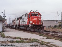 Headed for the connection with the Canpa Sub, a pair of SOO SD60s take an intermodal eastbound along the Oakville Sub by Burlington West station.