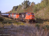 An SD75i and a pair zebra geeps lead a string of tanks westbound on the Halton at mile 30.  Of these three, only the 9650 has left the CN roster, now working as <a href=http://www.rrpicturearchives.net/showPicture.aspx?id=5374840>Vermont Railway 310.</a>