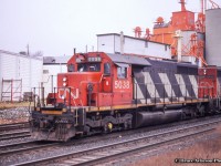 A pair of standard cab SD40-2s sit on the point of an eastbound at London East near the elevator.  5038 would be destroyed in a collision at Mont-Saint-Hilaire, QC in December 1999, while 5024 was sold to the BNSF in 1999 and rebuilt as BNSF 7327, <a href=http://www.rrpicturearchives.net/showPicture.aspx?id=1439002>renumbered BNSF 6987</a> around 2007, and finally to Webb Asset Management <a href=http://www.rrpicturearchives.net/showPicture.aspx?id=2740713>as WAMX 4165.</a>