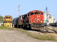 The land of four axle power. My earliest memories of Railfaning Stratford go back to the late 1990’s when CN still ran 432 between London and Toronto, back then any available four or six axle power was good enough to run the through freights. When CN took back the Guelph subdivision a few years ago everything changed, and any trains running west of Kitchener typically only get four axle power. Thankfully the GEXR still operates over its original line between Stratford and Goderich, and all with GP38’s. Here CN train 568 from Kitchener has finally made it to Stratford after clearing a work block west of Kitchener.  Power is a pair of well worked GP40’s. The train is busy working the yard while the landmark Mater feeds elevator looms in the  distance. This day the two GEXR units  have called it a day and are waiting for the next call to duty. 
