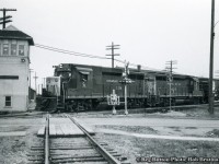 A pair of C&O GP30s hustle their westbound freight over the CN Hagersville Sub at Hagersville.