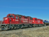 SD38-2s CP 3044 and 4444 (ex SOO) head west on the Scotford Sub with a transfer of tank cars from Clover Bar too Lambton Park.