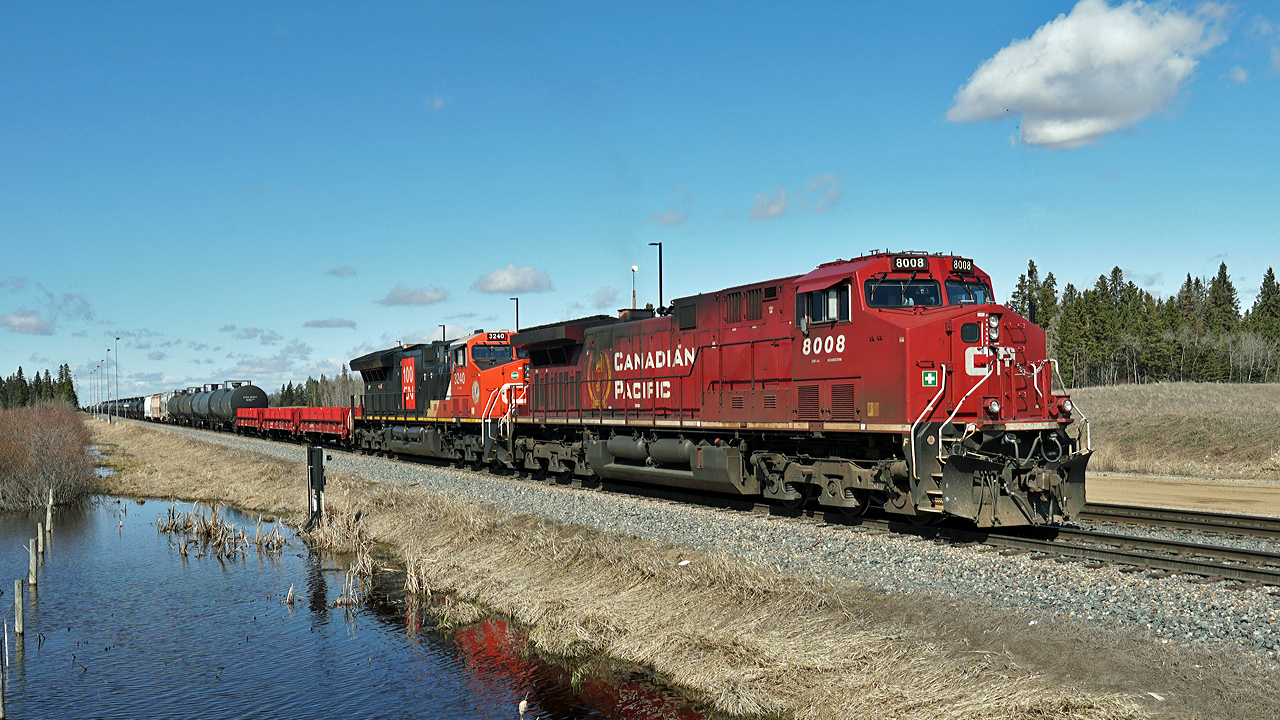 CP 8008 has CN 3240 trailing as it prepares to depart west from CP's Scotford yard.