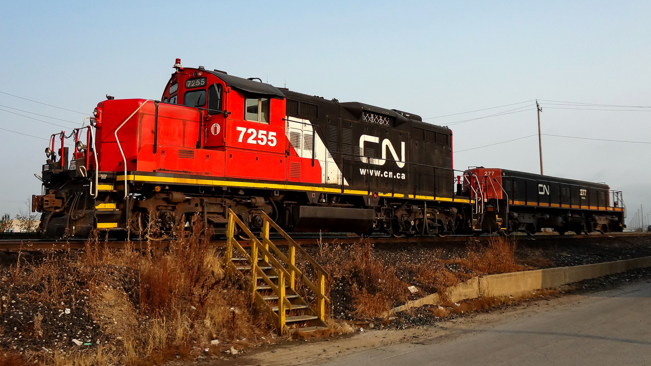 It's 07:30 at Mac Yard on September 1, 2015, and while waiting for the Engineering guys to arrive for a day of training on their the new Knox Kershaw KYC550 Yard Cleaner http://www.railpictures.ca/?attachment_id=20733, I was able to walk over from the Work Equipment shop to Green Tower/West Control and snap CN 7255 basking in the warm morning sun while the crew was in the tower picking up instructions on the next cut of cars to be shuffled.
CN 7255 is ex-CN 4217 which can be seen in this July 1988 Seth B. photo http://www.railpictures.ca/?attachment_id=48491
My thanks to Seth B. for his time, effort, and handy work in cleaning up, straightening, and otherwise correcting my photo of CN 7255 to make it presentable.