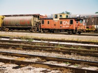 CN International Service caboose 78100 is seen waiting between assignments at CN’s London yard during an early fall morning. 