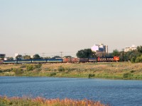 With a summer sized consist, VIA train 92 behind leased CN units nears its final destination of Winnipeg Union Station. Although a GP9 would occasionally substitute, a pair of F7Au locomotives were standard power on this tri-weekly train along with a steam generator unit from roughly 1972 until spring 1984. (I've been told that GMD-1s powered the train before that.) According to VIA Rail 1981 consist information in my collection, the summer train (June-September) ran with a baggage/crew sleeper, an unreserved coach, a cafe-coach-lounge, another coach, a diner, a 4-8-4 sleeper, a 10-5 sleeper, and a "Cape" lounge. The normal "winter" consist had a two "steam gennies", a 9600 series baggage car, the two coaches, a diner-lounge, and one sleeper. Note also the three refrigerator cars returning to Winnipeg after carrying groceries to northern Manitoba communities and a former CP diner substituting for the normal former CN car.
