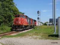 CN L568 with 9639 and 9449 head westbound at Waterloo Street in the town of New Hamburg as the vintage pair of widecabs head to Stratford on the Guelph Subdivision. 
