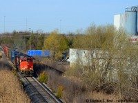 CN L542 seen blasting off at a blistering 10 MPH on the old Fergus sub heading for Guelph, passing one of the old factories that dot the landscape. On the other side of the factory was the former Grand River Railway Hesleper Sub (CP) that is now removed. Wonder if this place had rail service? As for the train, while it may look unremarkable to the average 'fan on this site, this was a very rare occurrence according to local historians - a CN GP40 running on the Fergus? Almost unheard of for this end of it. I can think of a few occasions in the GEXR days when either a leased CN GP40 set off or lifted cars in Guelph (432) on the Fergus or GEXR 3030 was assigned to 582, but apparently CN didn't send the big power on this branch before the GEXR takeover in '98, and since the takeover this was apparently the first time.. comment below folks who may have a rebuttal or evidence to this effect! tx.