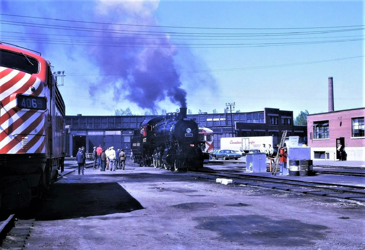 As my fading memory sort of remembers, the morning of Saturday May 22, 1971, was to be first movement of the 1057 under its own steam and only those who worked on or assisted with the project were supposed to know about the event.  Well working for CN (yes, I know, the competition) at the time, I apparently knew about it also.  The 4069 appears to be thinking, "I thought we were done with steam!!"
