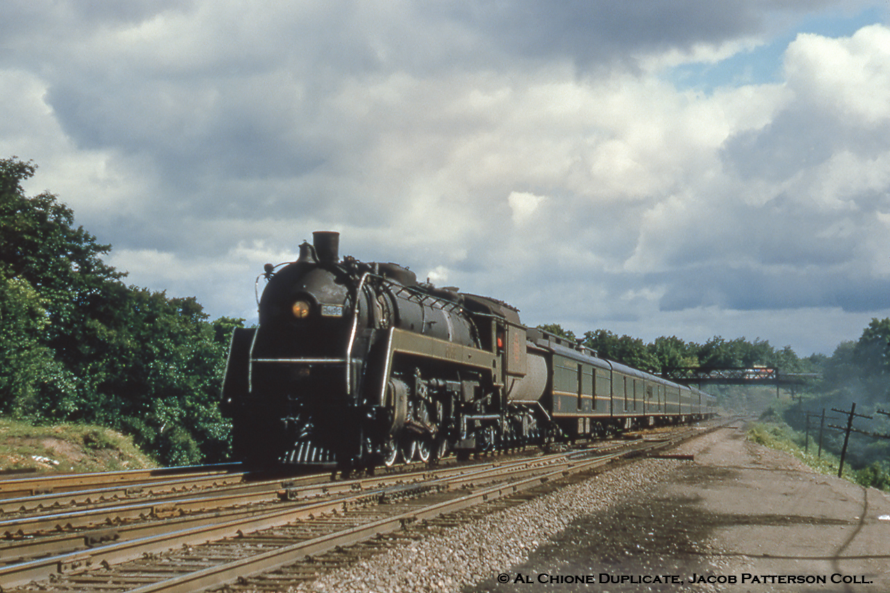 Train 101 runs out it’s last couple of miles to Hamilton James Street station, where it is due at 0900h, before continuing on to Nagara Falls as train 102.Original Photographer Unknown, Al Chione Duplicate, Jacob Patterson Collection Slide.