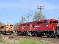A chance meeting this morning as H24 slowly pulls away from Ardent mill after dropping 4 CP hoppers in exchange for four others. A heads up lettering me know 8757 with the “Every Child Matters” leading 7030 “Strathcona” were approaching on train 132 paid off as the two trains passed in front of me.  Not bad for a Monday morning.