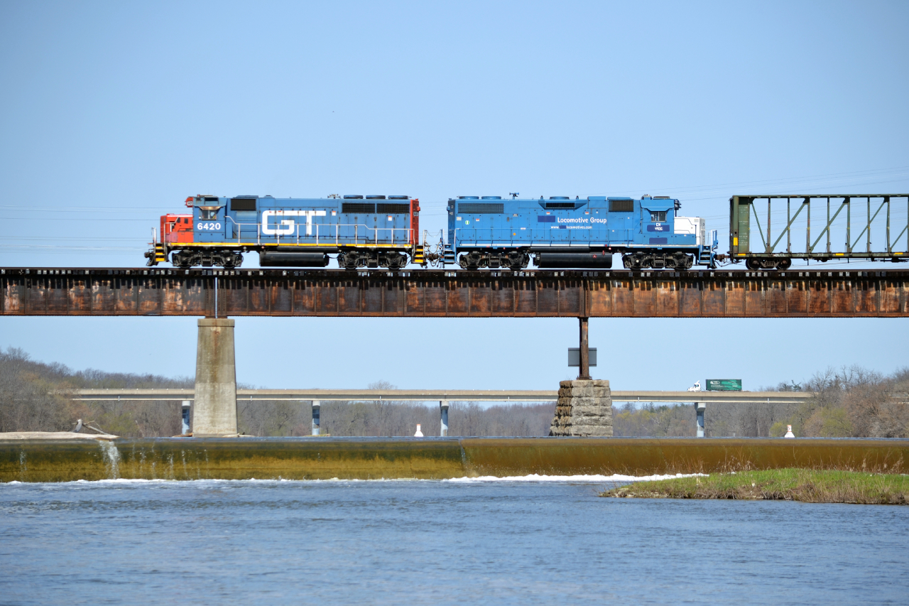 No mistaking this location. GTW 6420 at a snails pace, works its way over the Grand towards Hagersville to lift empties out of Mattice. It seems that good power doesn't last long in Brantford, having already been sent out to Aldershot and now Oakville on 581. Thankfully, for the one out of two days, the weather cooperated.