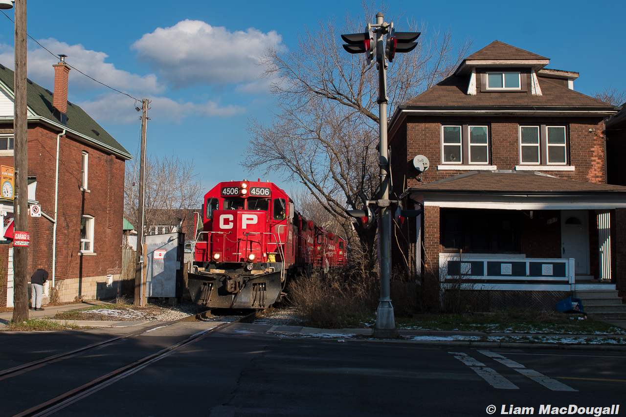 CP 4506 is on point of TH11 as it sneaks through some of the gorgeous brick houses that litter most of Hamilton.