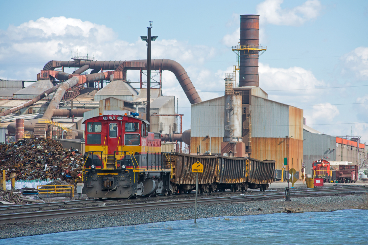 GMTX 196 is a recent addition to the small fleet of end cab switchers at the Evraz steel mill in Regina.  The KCS heritage of the unit is still quite prevalent as it shuffles some battered mill gons between the furnace and the many piles of scrap in the yard.