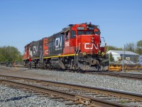Bill Purdy caught <a href=http://www.railpictures.ca/?attachment_id=48761>one of the three 7500s</a> assigned to Kitchener at the moment, here we see the other two.  7502, 7512 working out of Preston on L542.  Here they have returned to Guelph after working Flochem, crossing over onto the Guelph Sub to access XW20, and shortly after, the Guelph North Spur.  Note the portable ditch lights on 7502.