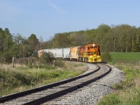 583 heads for Guelph to work around <a href=http://www.railpictures.ca/?attachment_id=48813>the St. Patrick's Ward</a> neighbourhood.  South of Corwhin, they are approaching the crossing known as "Danger Bell" in reference to the <a href=http://www.railpictures.ca/?attachment_id=31507>style of crossing protection</a> used here in years past which featured a flashing "DANGER" sign.