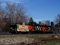 A shoving platform is leading as The Pointe St-Charles Switcher shoves towards Track 29 to pick up some grain cars.