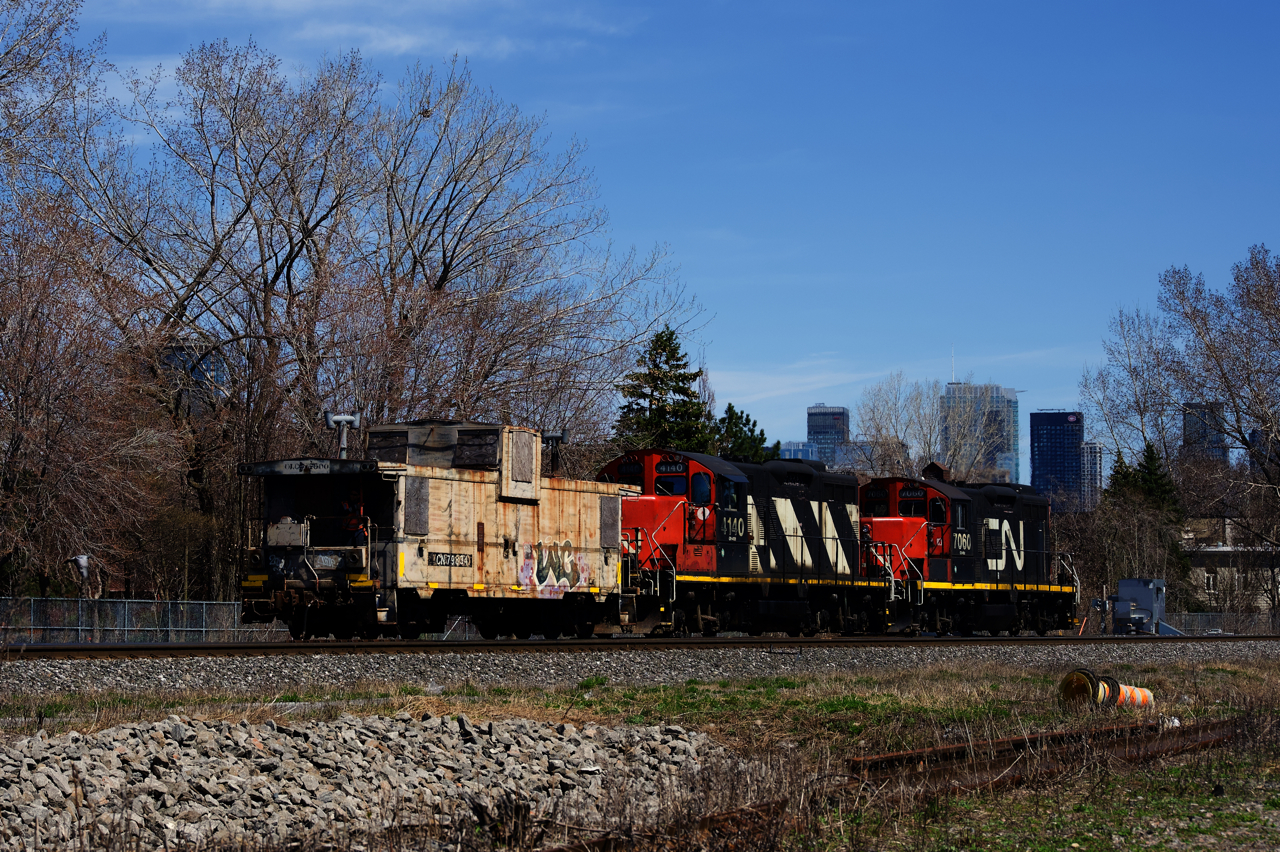 A shoving platform is leading as The Pointe St-Charles Switcher shoves towards Track 29 to pick up some grain cars.