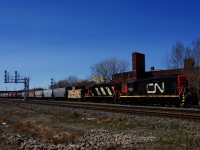 CN 7060 & CN 4140 is the power on The Pointe St-Charles Switcher as it departs from Track 29 with loaded grain cars.