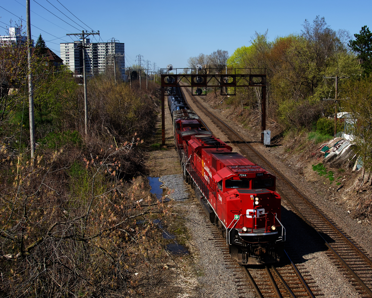 Ethanol train CP 528 (formerly CP 650) has just departed southwards with a new crew onboard as it approaches North Jct with CP 7044 & CP 9819 up front. It is coming off of the Farnham Connection and onto the Adirondack Sub.